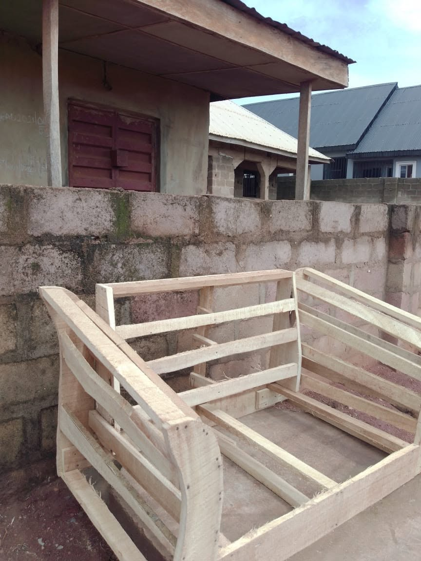 Wood frame for an upholstered seating piece during workshop construction