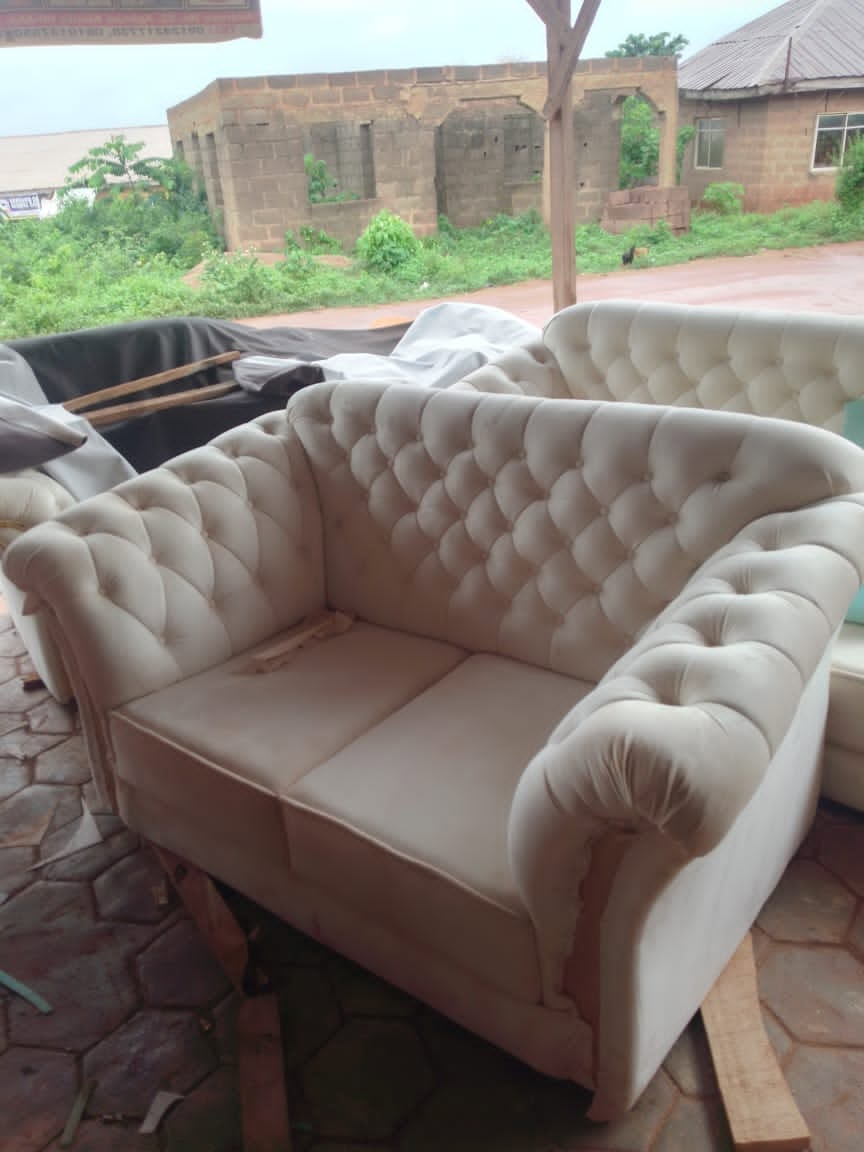 Tufted upholstered armchair photographed in the workshop