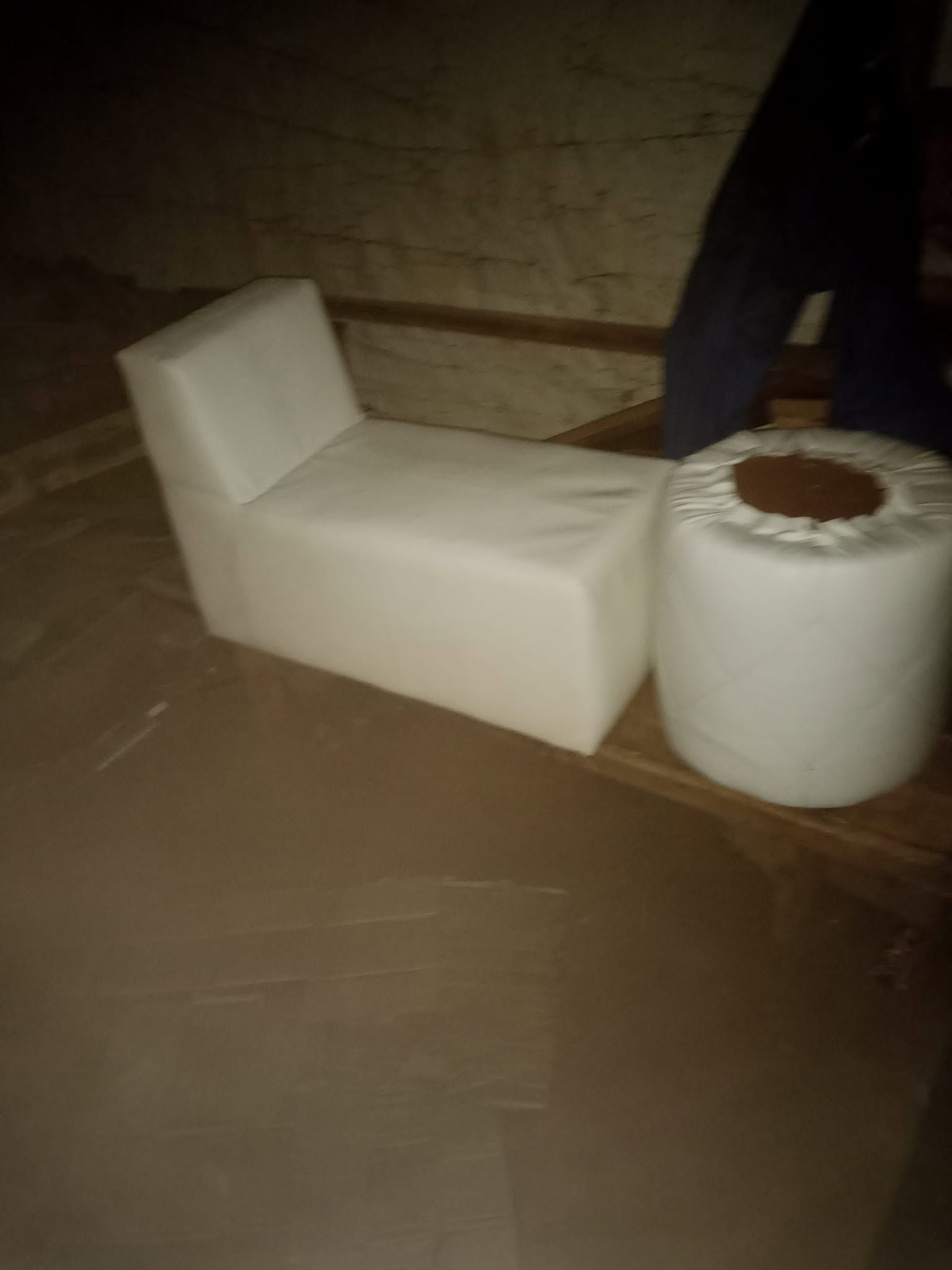 White and brown sectional component photographed during workshop progress