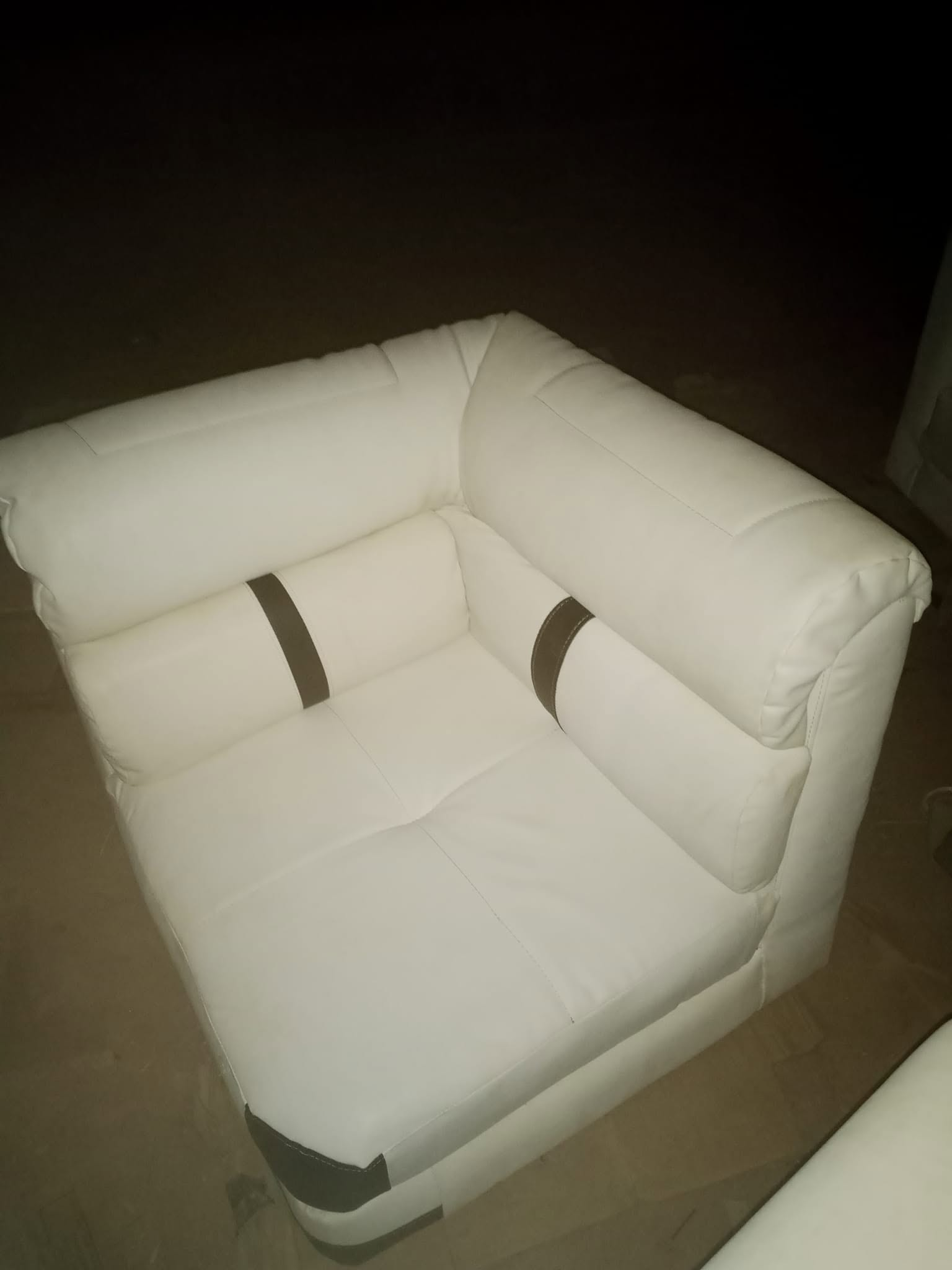 White and brown sectional photographed as a finished piece at the workshop